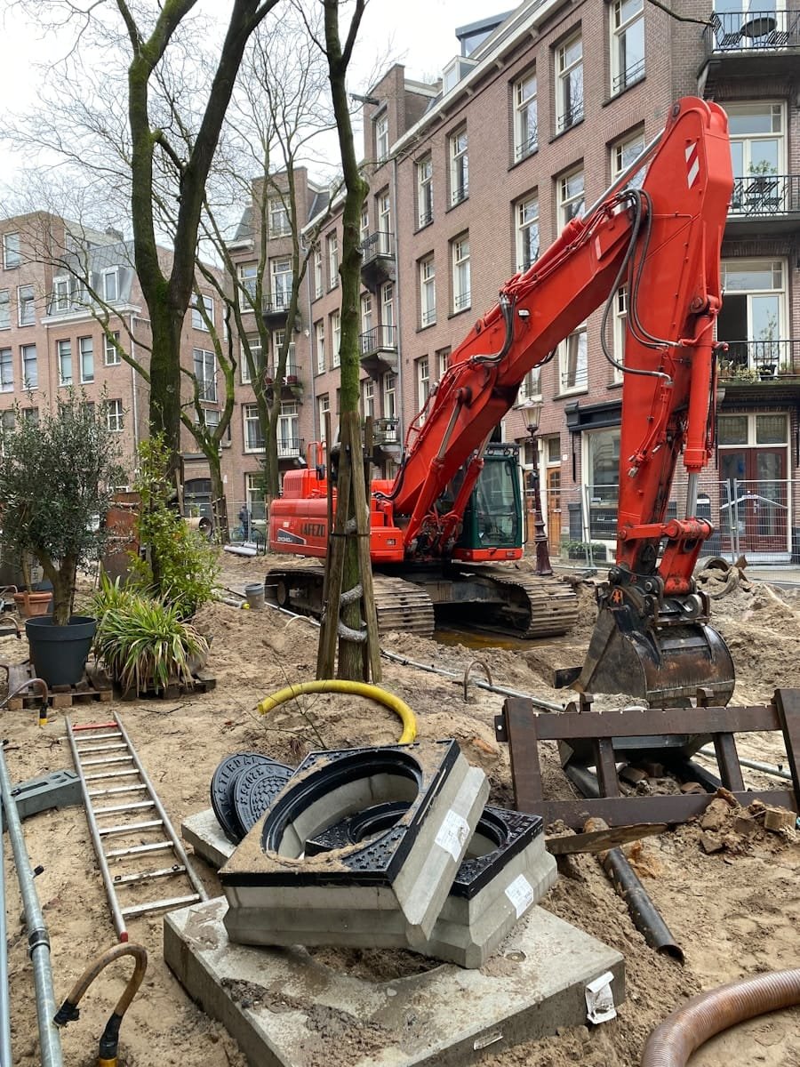 Orange excavator working on a groundworks site, supplied through plant operator recruitment